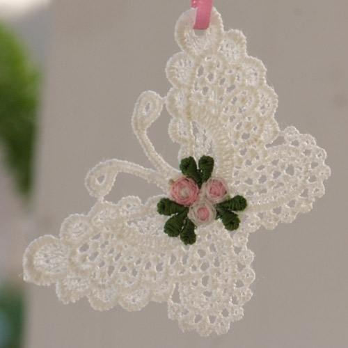 A white crocheted butterfly