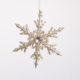 Glittery gold colored snow flake for decoration