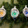 Three Gold Color Balls Hanging on the christmas Tree