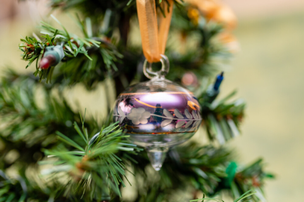 A close-up shot of hand-painted purple color crystal ball