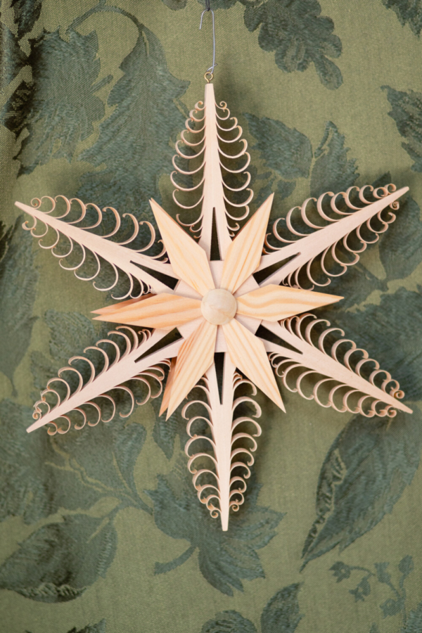 Wooden carved fancy star hanging for decoration