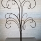 Black colored adjustable ornament stand