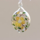 Hand-painted yellow flowers on the egg shape crystal ball