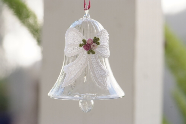 Crystal bell with a white Vine lace bow and flower