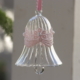 Egyptian Glass Crystal bell with a Fancy pink lace band