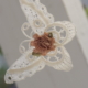 Hanging Butterfly shape in white lace and a brown flower