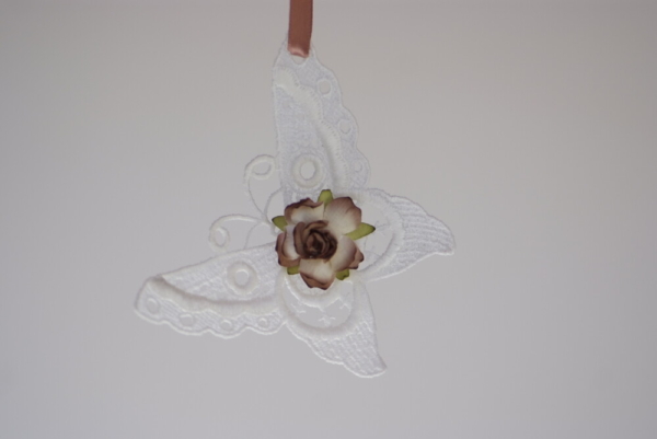 Hanging Butterfly shape white lace and a brown flower