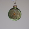 Round heart shape rotated hanging in red and green glitter