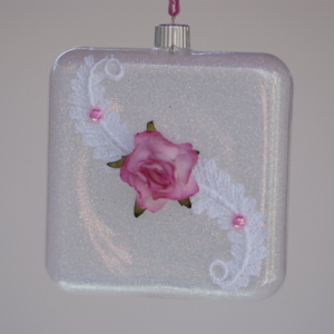 Square shape hanging with white lace and pink flower