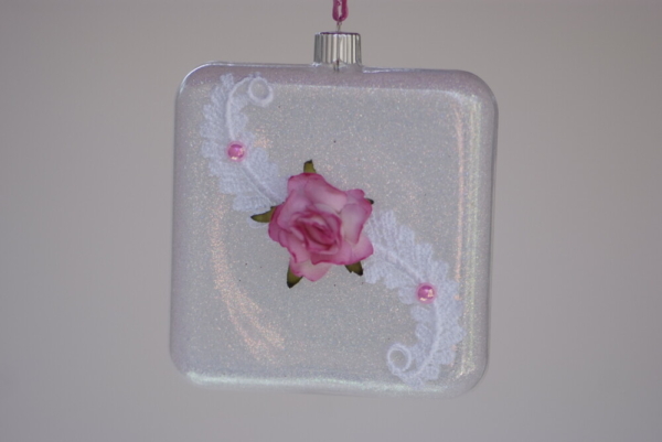 Square shape hanging with white lace and pink flower