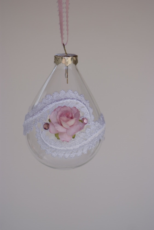 Crystal bell with white vine lace and pink flower