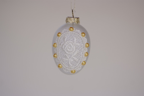 Egg shape hanging with white Rose lace and gold beads