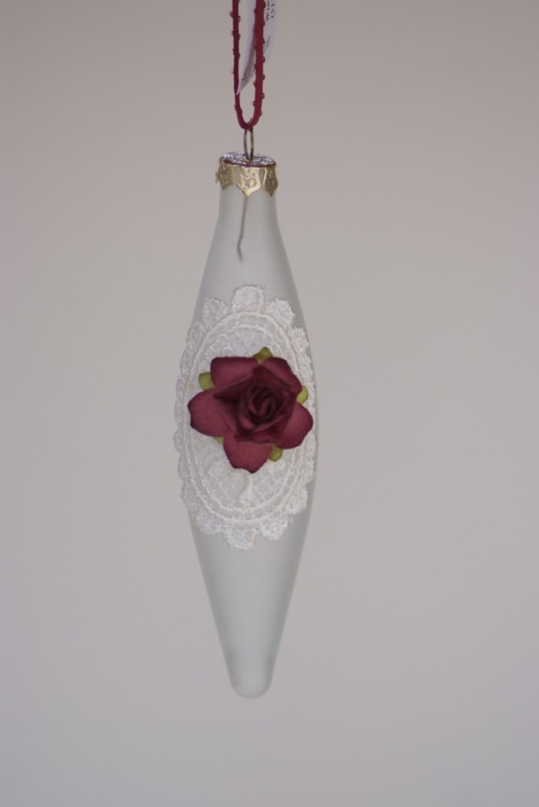 Cone shape hanging with white lace and a red rose