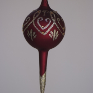 Hand painted gold and silver color design on Maroon Ball